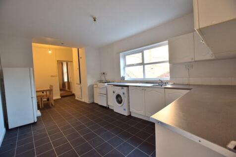 Bright and functional kitchen space featuring a...