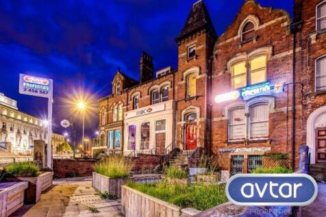 A charming street view of traditional terraced ...