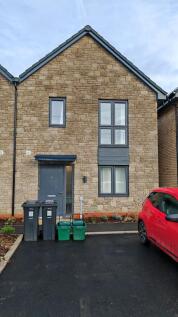 Charming front view of a modern terraced house ...