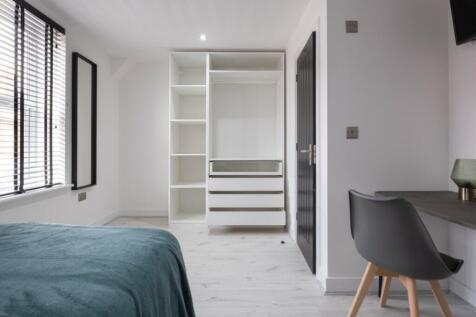 Bright and inviting double bedroom featuring a ...