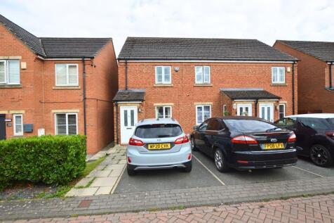 Attractive front view of a modern brick terrace...