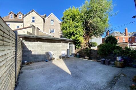 A well-maintained garden area with ample sunlig...