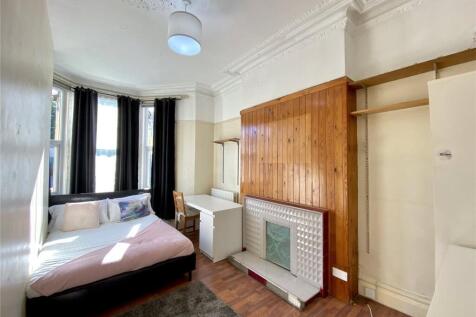 Bright and cozy double bedroom featuring large ...