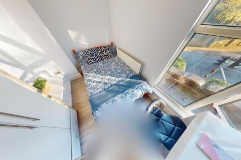 Bright and modern single toilet room featuring ...