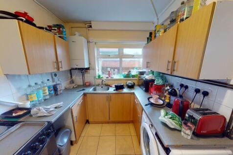 Bright and functional kitchen with ample natura...