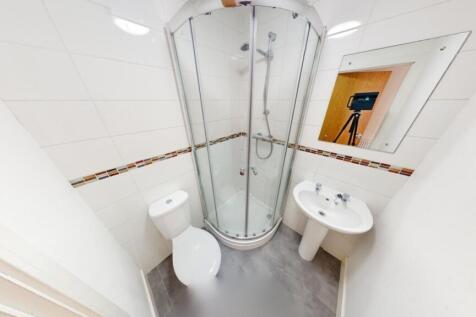 Bright and clean bathroom featuring a modern co...