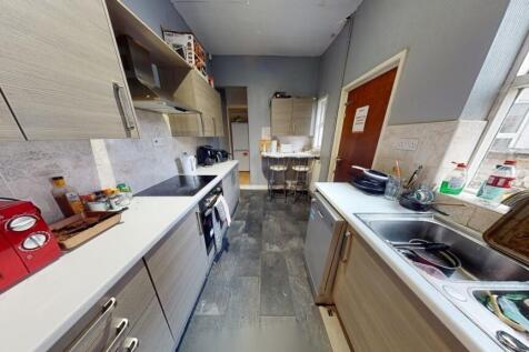 Bright and modern kitchen space featuring ample...