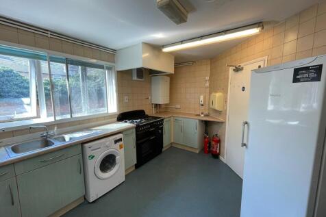 Bright and functional kitchen featuring ample c...
