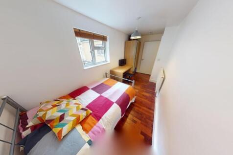 A bright and inviting double bedroom featuring ...