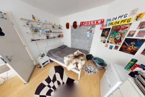 A cozy and inviting double bedroom featuring vi...