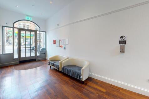 Bright and welcoming reception area featuring p...