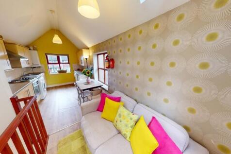 Bright and cozy living room with contemporary d...