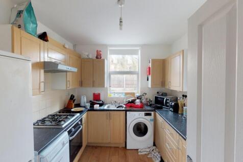 Bright and functional kitchen featuring ample c...