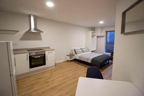 A modern and well-maintained master bedroom wit...