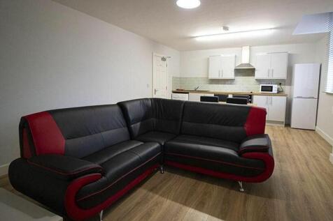 Inviting living room featuring a spacious layou...