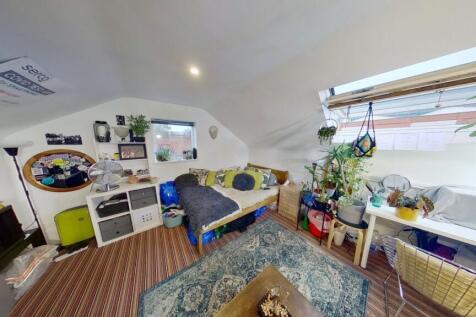 Bright and cozy living room with a comfortable ...