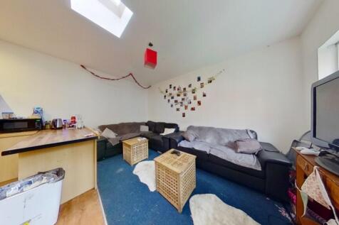 A cozy living room with ample seating space inc...