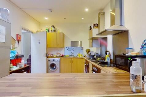 Bright and functional kitchen featuring ample c...