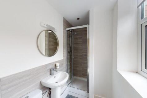 Bright and clean bathroom featuring a modern co...