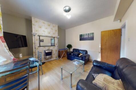 Bright and inviting living room featuring comfo...