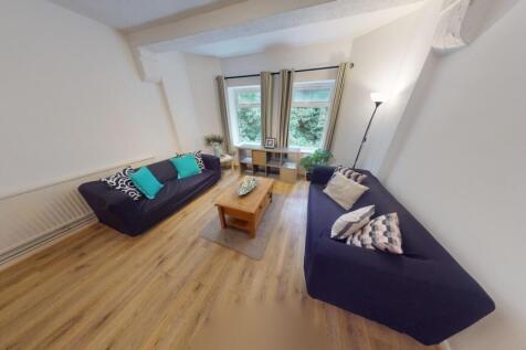 Bright and welcoming living room featuring ligh...