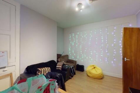 A cozy living room featuring comfortable seatin...