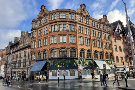 A charming historic terraced building with dist...