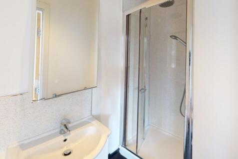 A bright and clean bathroom featuring a modern ...