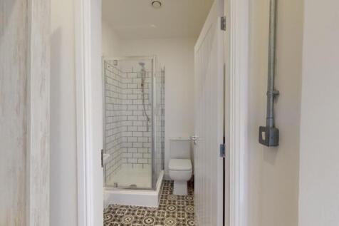 A tidy and well-maintained bathroom featuring m...