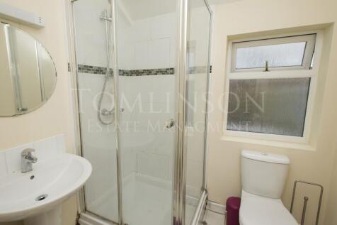 A neat and well-maintained bathroom featuring a...