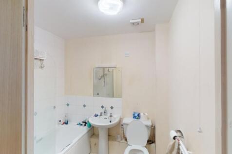 A functional bathroom with essential amenities,...