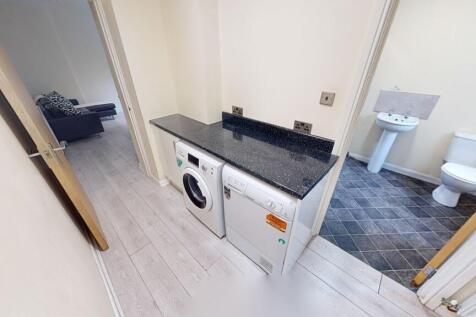 A neat and well-maintained bathroom featuring a...