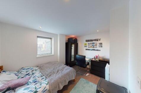 Bright and inviting master bedroom featuring a ...