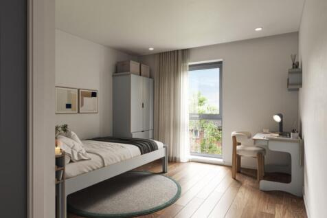 A stylish and well-lit double bedroom, perfect ...