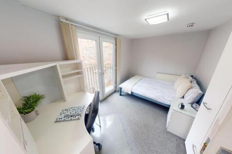 Bright and tidy single bedroom featuring a comf...