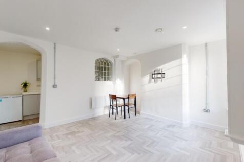 A bright and spacious modern living room, perfe...