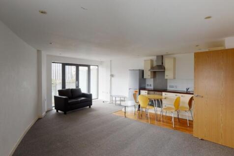 Spacious and modern open-plan living area featu...