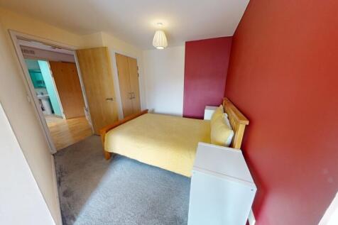 Bright and inviting double bedroom featuring a ...