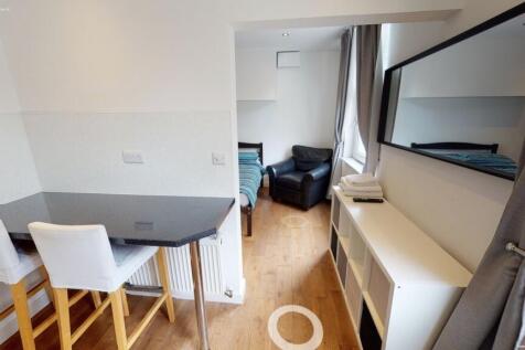 Bright and well-maintained living area featurin...