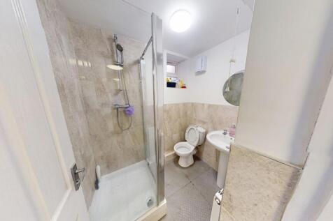A well-maintained bathroom featuring a modern s...