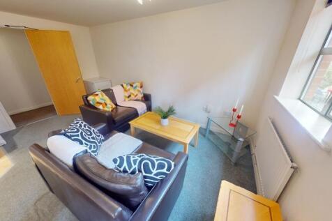 A cozy living room featuring two comfortable so...