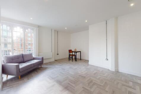A spacious and bright modern living room perfec...