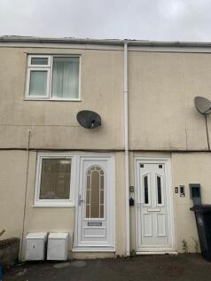Front view of a well-maintained terraced proper...