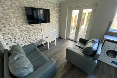 A cozy living room featuring modern furnishings...