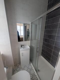 This modern bathroom features a sleek design wi...