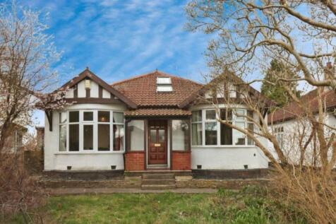 Charming front view of a picturesque property f...