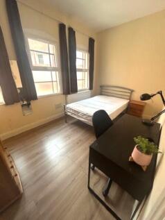 Bright and tidy single bedroom featuring two la...