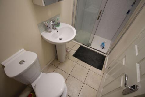 A well-maintained bathroom featuring a modern s...