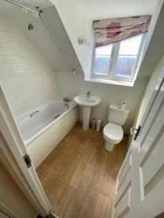 This beautifully designed bathroom features mod...