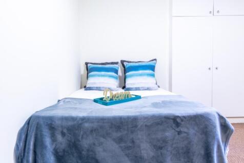 A beautifully presented double bedroom featurin...